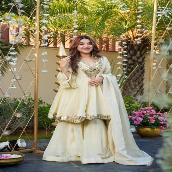 Elegant Off-White Silk Peplum Sharara Set with Heavy Gota & Mirror Work