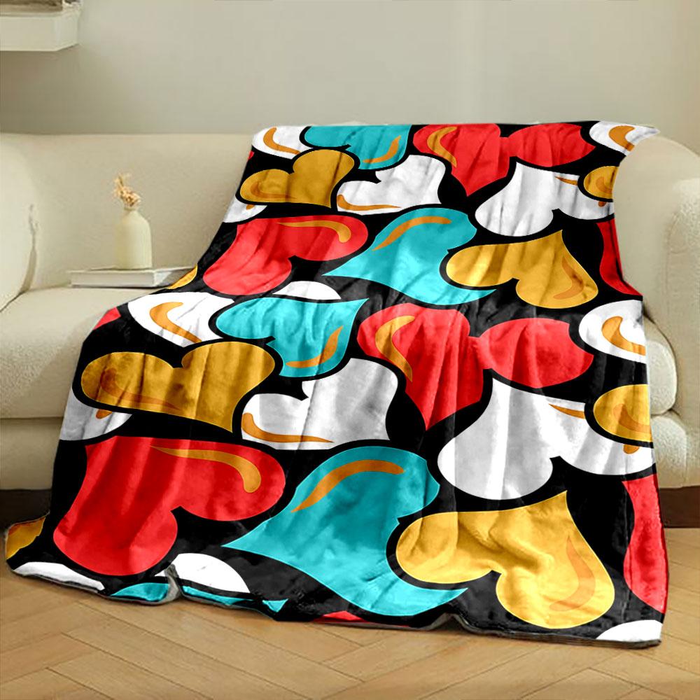 Colorful heart shapes in red, yellow, white, and blue on a black background. for all seasons blanket lunch break throw gift