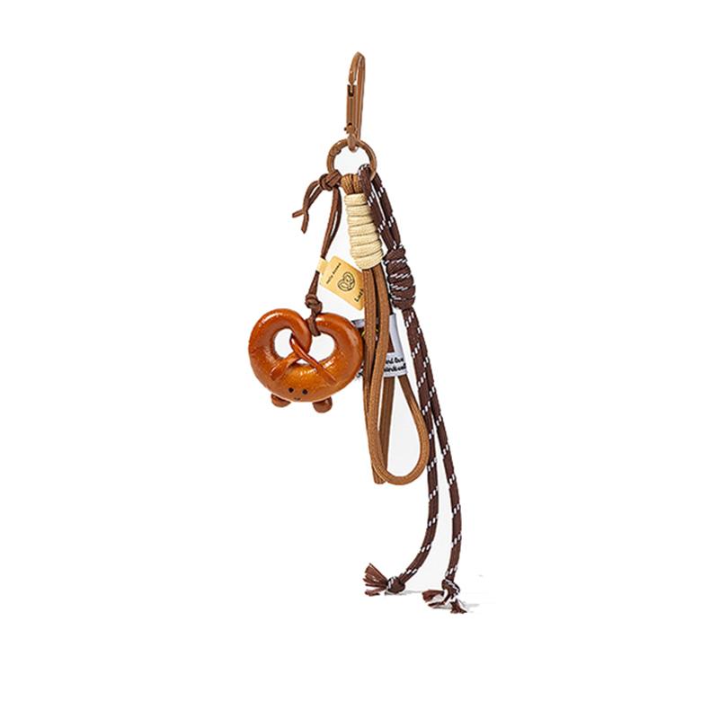 Yogodlns Подвеска в виде рогалика с щелочной водой, симпатичное улыбающееся лицо, плетеная веревочная сумка, аксессуар ручной работы, модный подарок