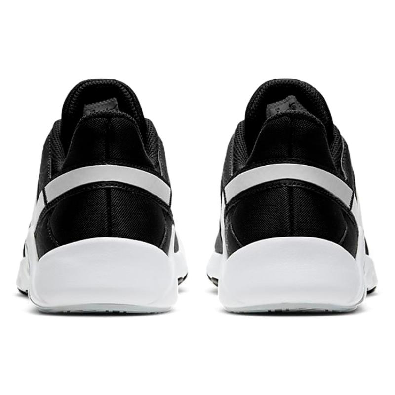 Nike Женские тренировочные футбольные бутсы Legend Essential 2 Черно-белые CQ9545-001
