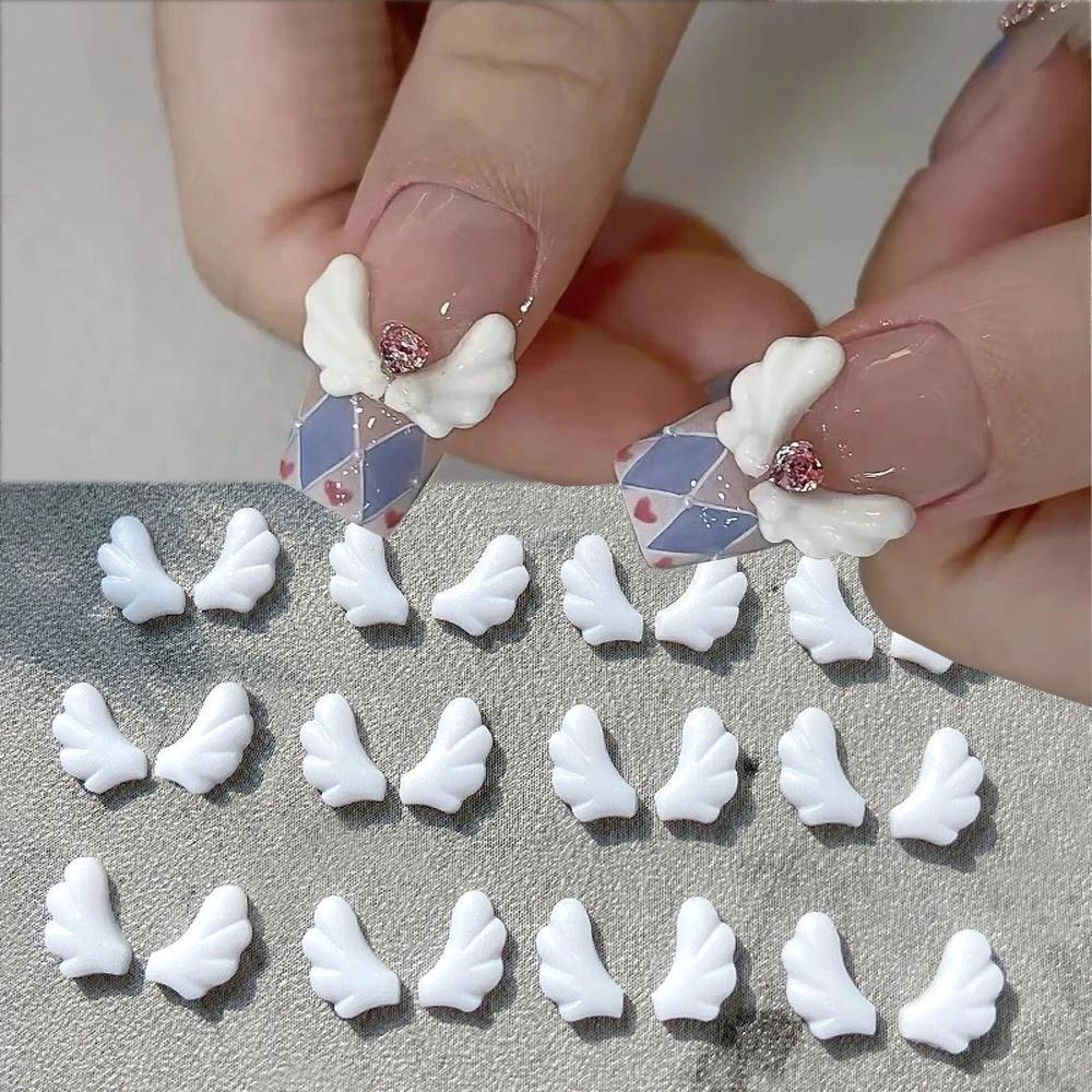 50 шт. левые/правые сращенные крылья ангела, подвески для дизайна ногтей, левые и правые крылья, белая смола, инструменты для украшения ногтей