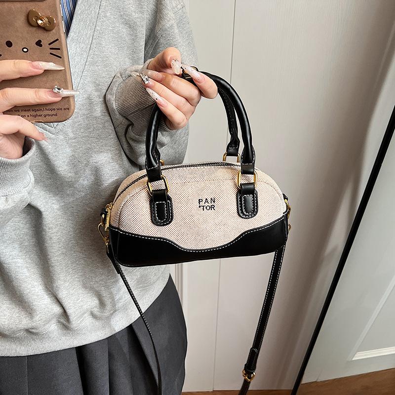 Весенне-летние женские сумки высокого класса 2025 новая модная универсальная нишевая сумка-мессенджер супер горячая портативная сумка Boston