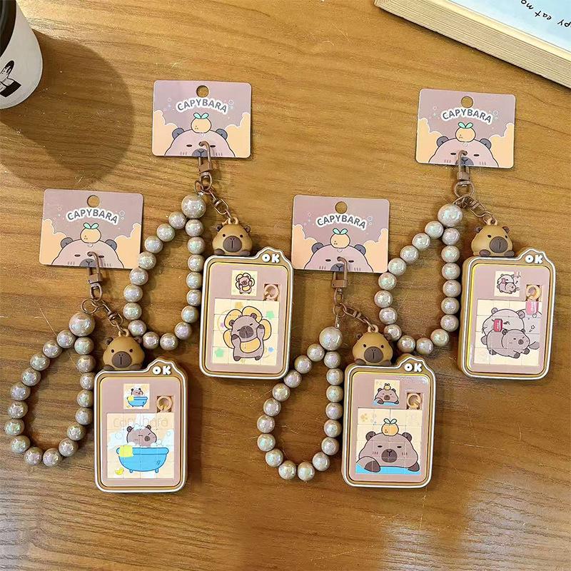 Брелок-пазл Капибара Хуажун Дао: Милый кулон-подвеска на школьный рюкзак в виде капибары и маленький подарок