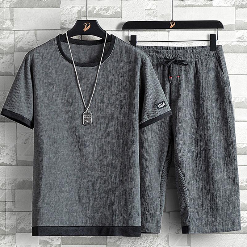 Men's Summer Ice Silk Two-Piece Set: Short-Sleeve Shirt and Cropped Pants, Loose Fit, Casual Sports Style, Large Size Available.