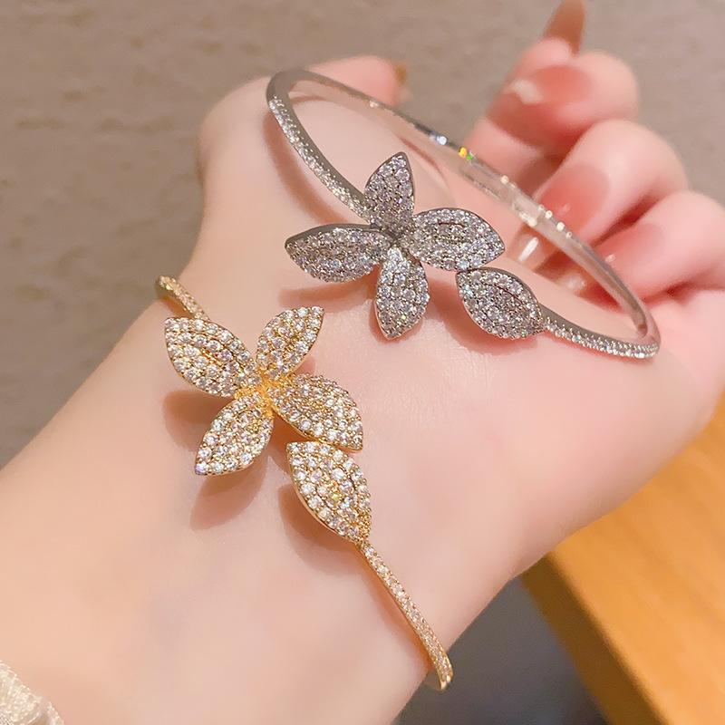 Niche four-leaf flower butterfly open zircon bracelet bracelet versatile hand jewelry women