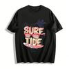 Наденьте футболку с принтом 'Surf Tide' от Shades и оседлайте волну летней жизни. Футболка из чистого хлопка