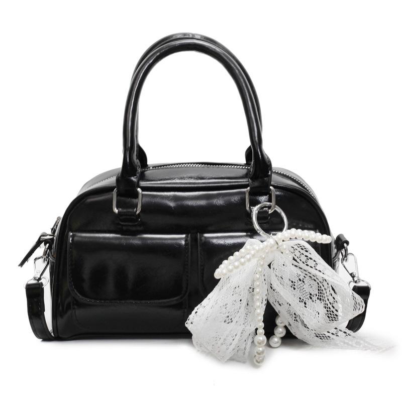 Корейская версия популярной весенне-летней дофаминовой простой портативной сумки-бостонки, нишевая повседневная сумка-мессенджер в иностранном стиле для通勤, женская