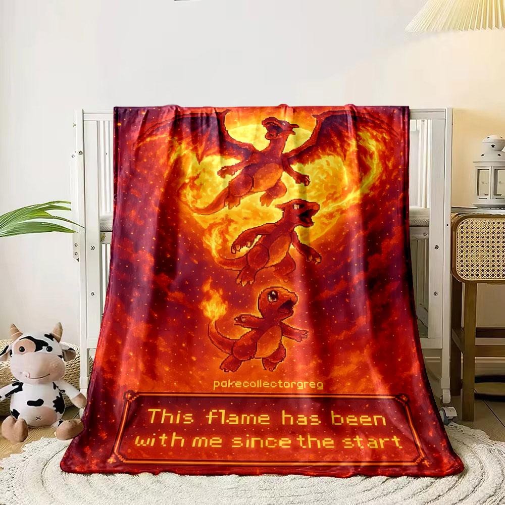 Fiery evolution sequence of Charmander to Charizard against molten flames. for all seasons blanket lunch break throw gift