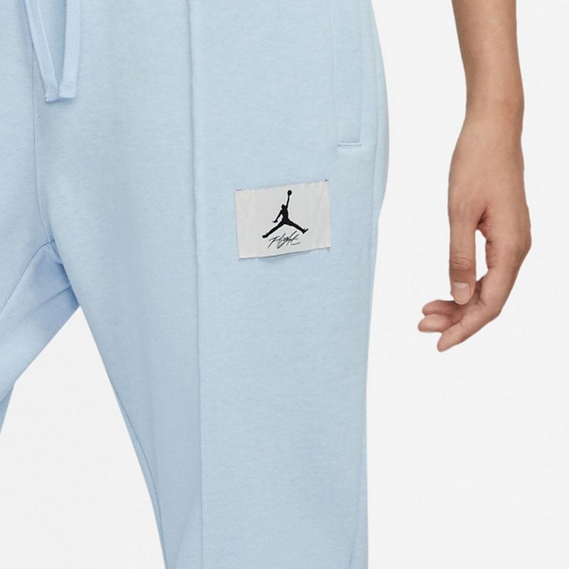 Nike Спортивная одежда Джоггеры с логотипом и эластичной резинкой на талии и манжетами Женские брюки серого цвета DD7002-438