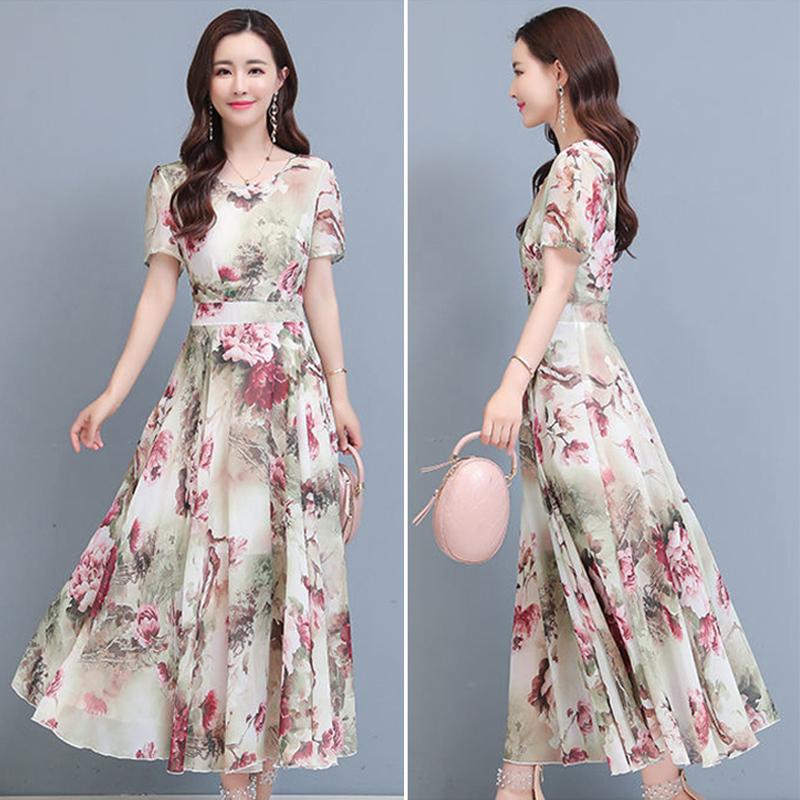 New Elegant Floral Fashion Dress Women's Summer Fashion Cover Belly Slim Long Flowing Dress Beach Skirt.