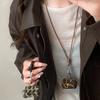 Leopard Print Change, Earphones, Bags, Neck Necklaces, Autumn and Winter Maillard Sweater Chains, Fashion Temperament Items.