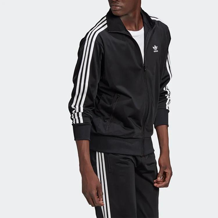 Adidas Originals recycled embroidered-stripe track jacket (Unisex) Jackets GN3521