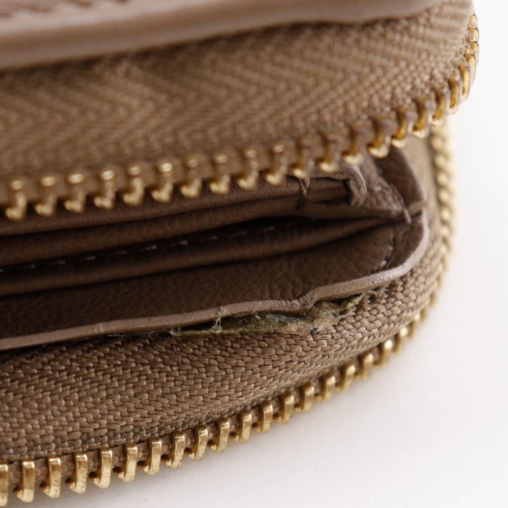 Louis Vuitton Zippy Wallet Purse M81511 Monogram Coussin Taupe Beige Lambskin Women Used