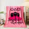 Geometric shapes with masked figures in pink costumes and bold text. for all seasons blanket lunch break throw gift