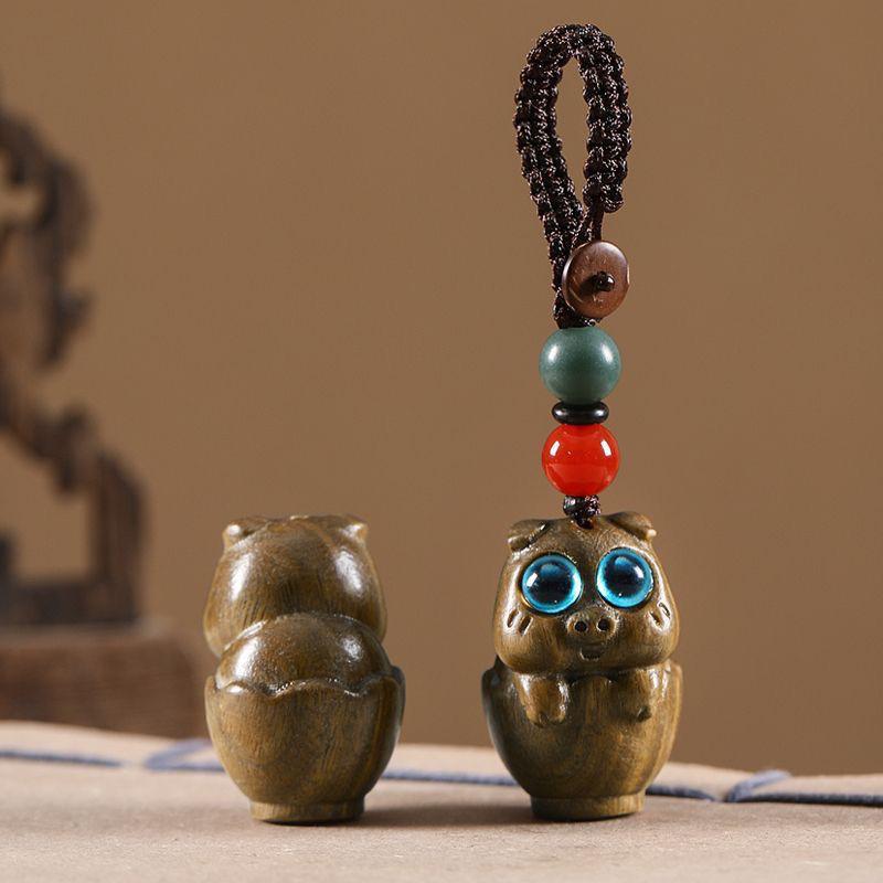 Twelve Zodiac Animal Charms Green Sandalwood Set: Rat, Ox, Tiger, Rabbit, Dragon, Snake, Horse, Sheep, Monkey, Rooster, Dog, Pig.