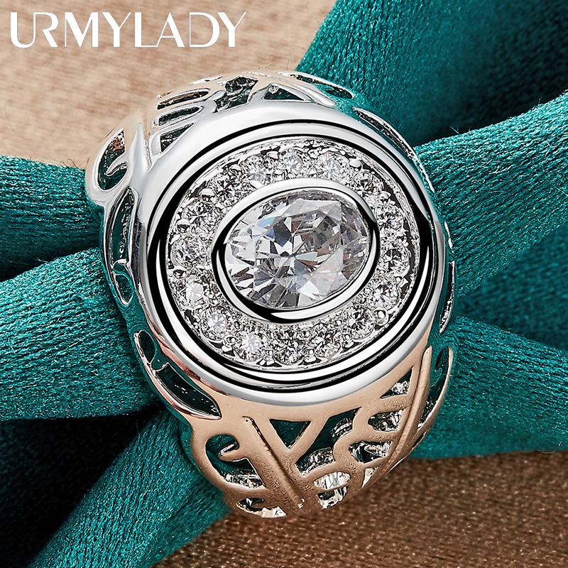 Серебряное кольцо в форме часов с фианитами