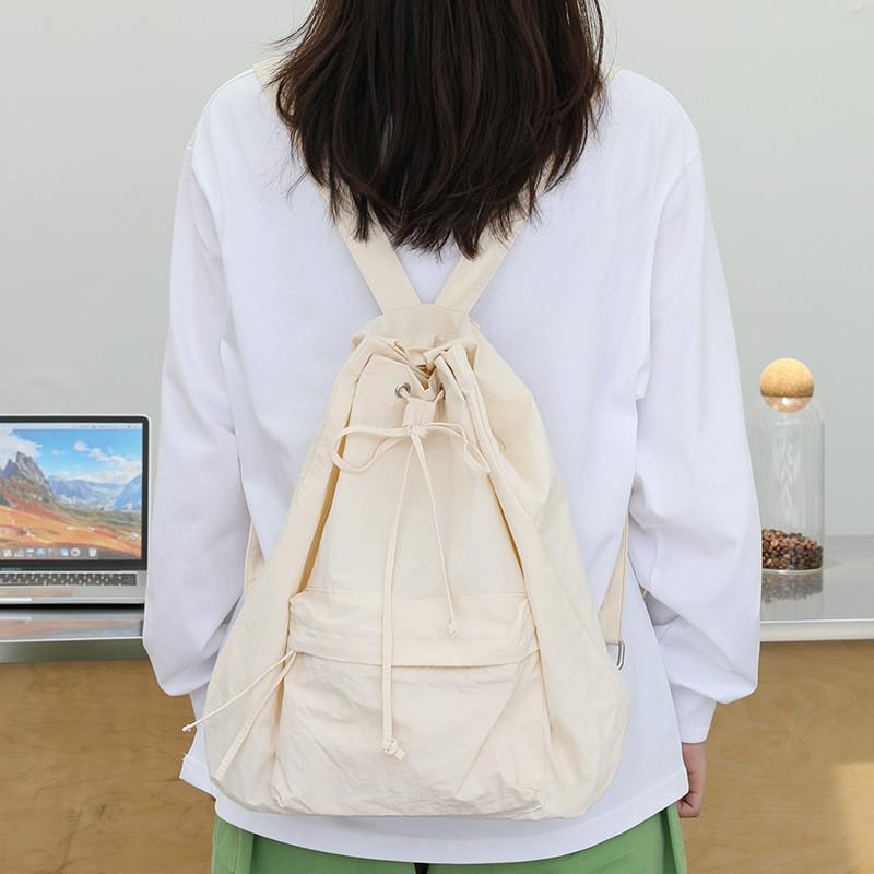 IELGY Korean Version of Casual Literary Canvas Backpack, Fashionable Nylon Solid Color Small Fresh Drawstring Backpack