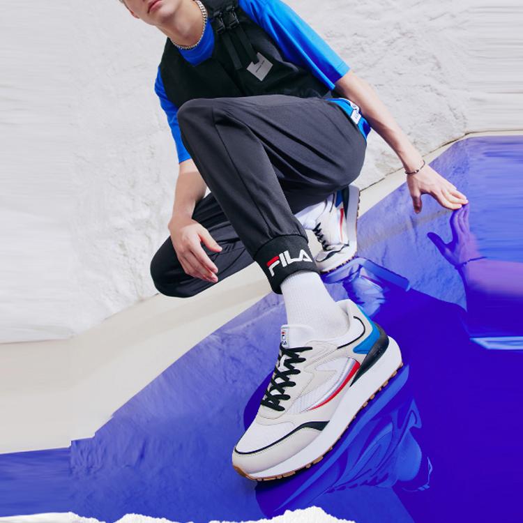 Fila Вязаные дышащие спортивные брюки с манжетами Мужские Низ Легендарно-синие F51M138619FNV