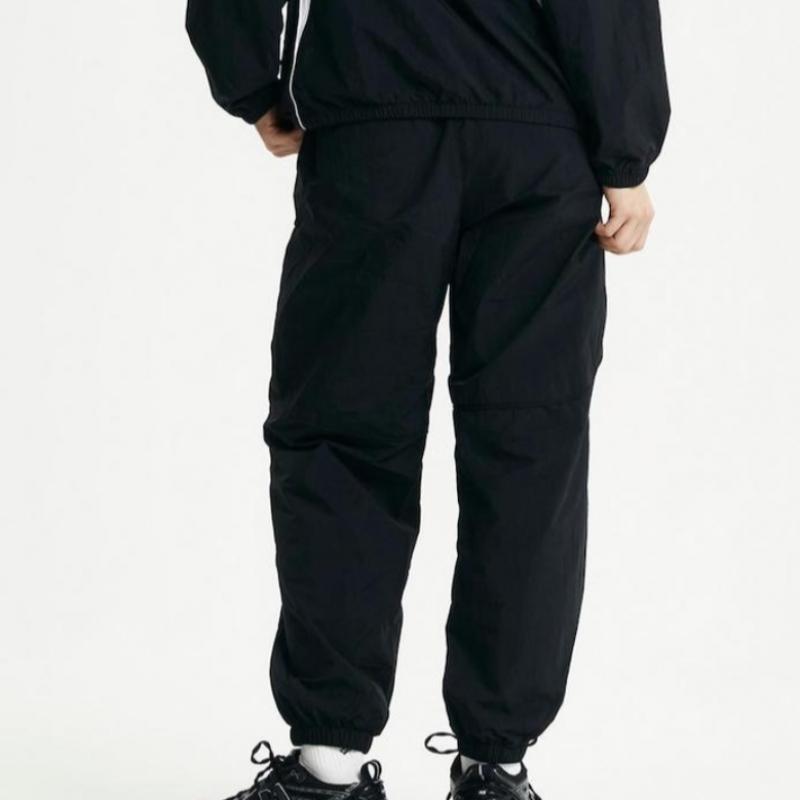 New Balance Спортивные штаны Uni Runners Nbnte22423