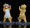 Фигурка кошкодевочки из сои: Милая фигурка в сидячей позе, едящая рыбу