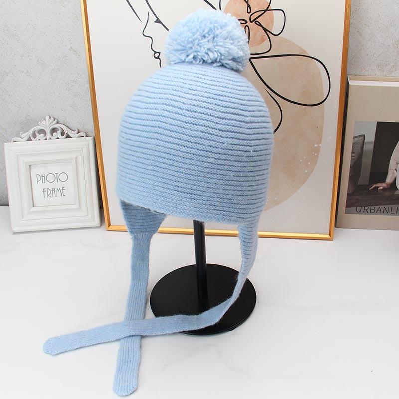 Cute hairball lace-up ear hat retro knitted wool hat autumn and winter outdoor cold-proof face little Lei Feng hat
