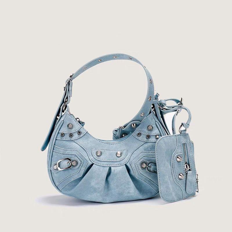 Locomotive bag, rivet tassel bag, pleated bag, punk style, underarm bag, fashion and high-end shoulder women's bag.