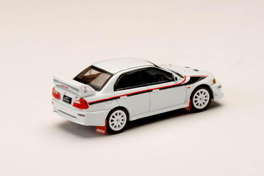 Mitsubishi Lancer GSR Evolution 6 Special Color Package 2000 with Mud Flap Scotia White 1/64 (T.M.E.)
