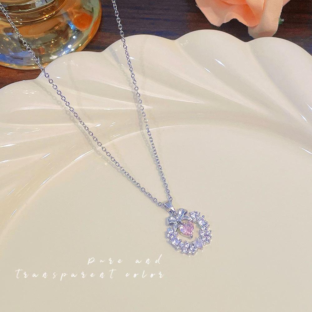 Women's Japanese and Korean Christmas Bow Wreath Necklace with Pink Diamond Heart on Titanium Steel Chain