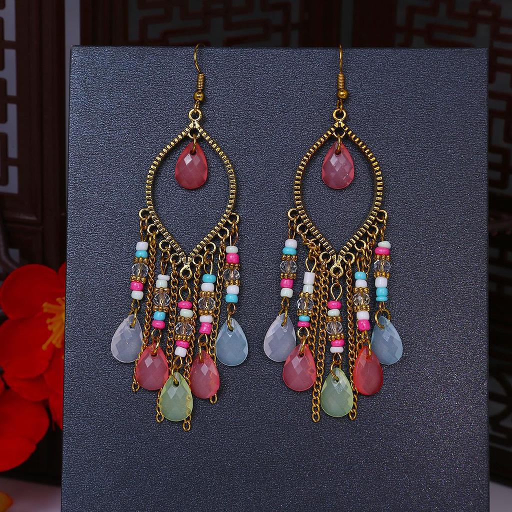 Серьги-кисточки с рисовыми бусинами и каплями воды в стиле бохо - этнический стиль, яркая индивидуальность