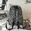 Рюкзак с леопардовым принтом Повседневный Модный уличный стиль Легкий рюкзак для женщин с деталью в виде кисточки для школы, путешествий и повседневных прогулок
