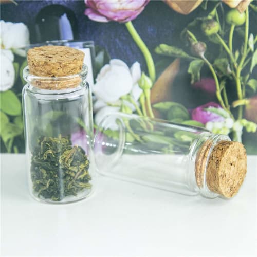 12 50ml clear glass bottles suitable for storing candy flavoring powders and liquids.