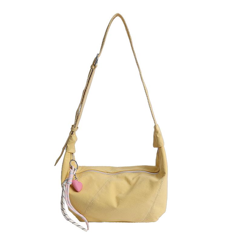 2025 summer new Korean version of casual street personality shoulder bag college students simple fashion dumplings messenger bag bag