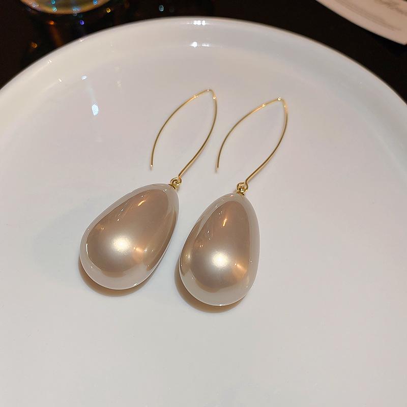 Изысканные серьги-кисточки из циркона: Блестящий, Универсальный, Минималистичный Дизайн с Привлекательностью Легкой Роскоши.