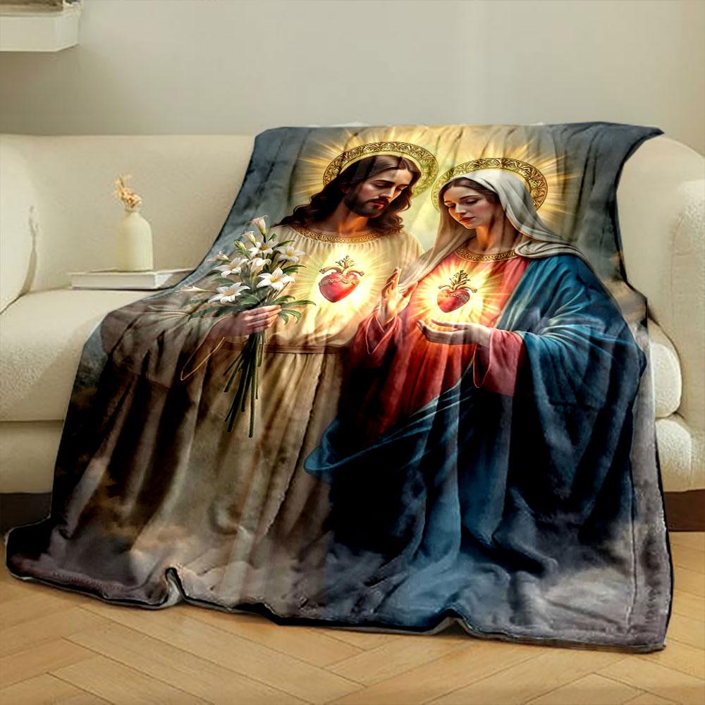 Two figures with glowing halos, sacred hearts, lilies, and radiant light. for all seasons blanket lunch break throw gift