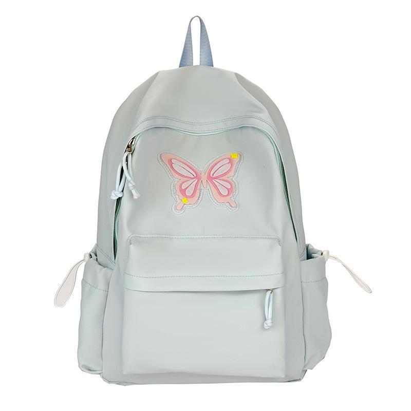 Spring and summer new student cute backpack women's fashion simple printing butterfly junior high school large-capacity schoolbag women