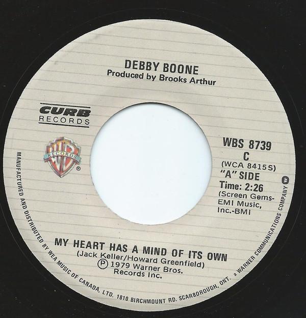 Пластинка 7 дюймов DEBBY BOONE - My Heart Has A Mind Of Its Own WBS8739 Warner Bros. Канада 1979 г. Почтовая марка, использованная