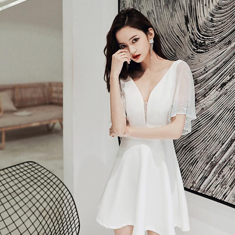 Новый банкетный модный темперамент тонкое платье короткое платье-слово ночной клуб светская львица ежегодная встреча юбка