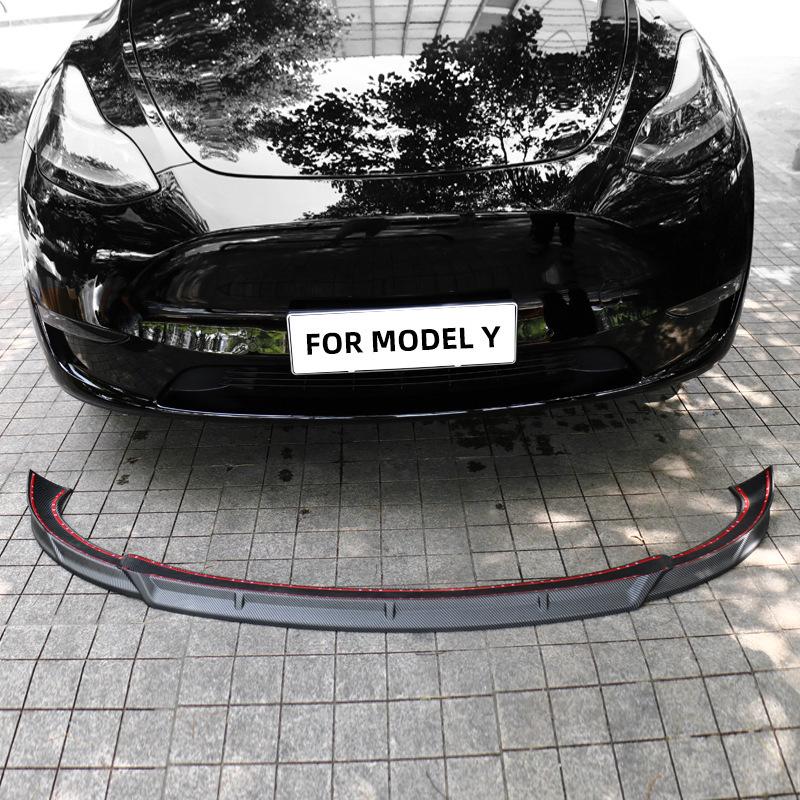 Carbon Fiber Body Kit for Tesla Model Y: Front Lip, Side Skirts, Rear Spoiler.