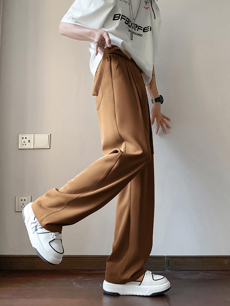 Брюки из итальянского драпированного ледяного шелка в стиле британских яппи с завязками