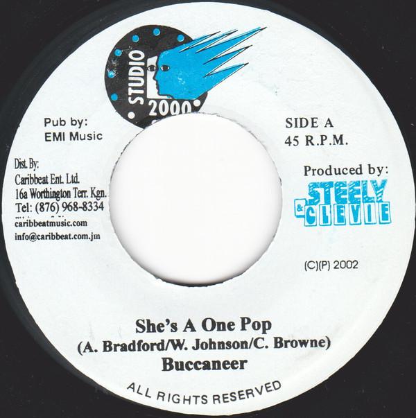 7-дюймовая пластинка BUCCANEER - She's A One Pop NONE Studio 2000 2002 Ямайка Регги, Ска и Даб Б/у