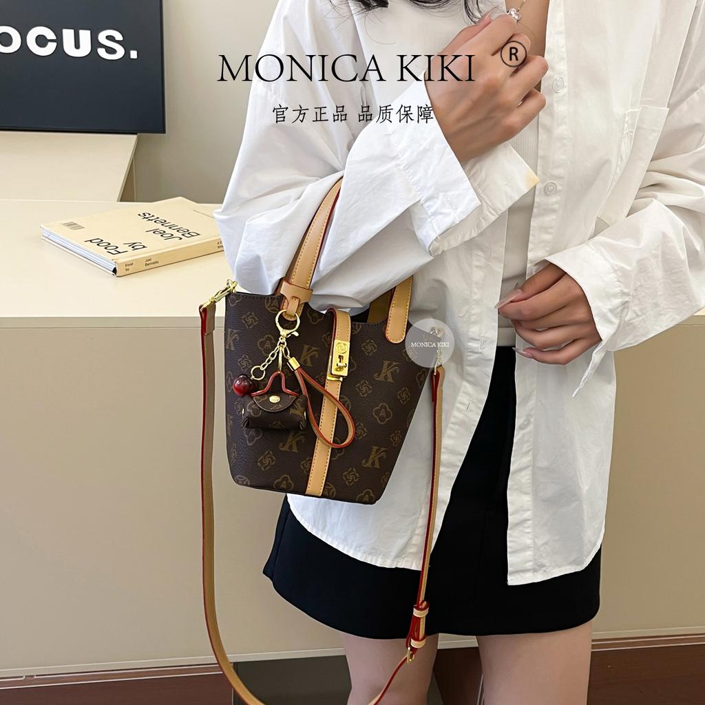 European and American trendy high-end sense retro printing portable bucket bag women's 2025 new large-capacity fashion versatile messenger bag