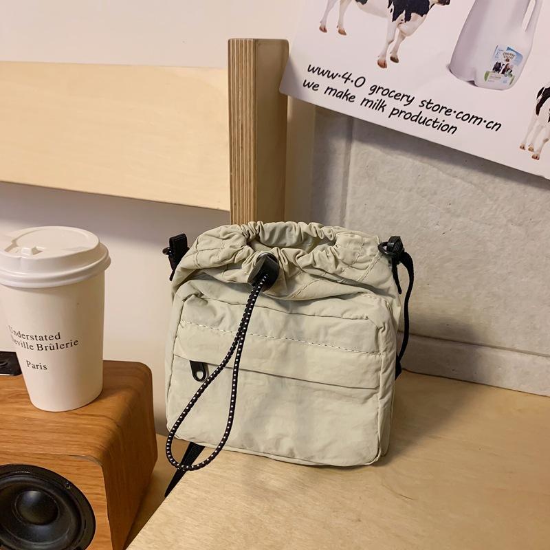 Original versatile mobile phone bag dopamine color scheme pleated drawstring bag fashionable and lightweight shoulder messenger bag