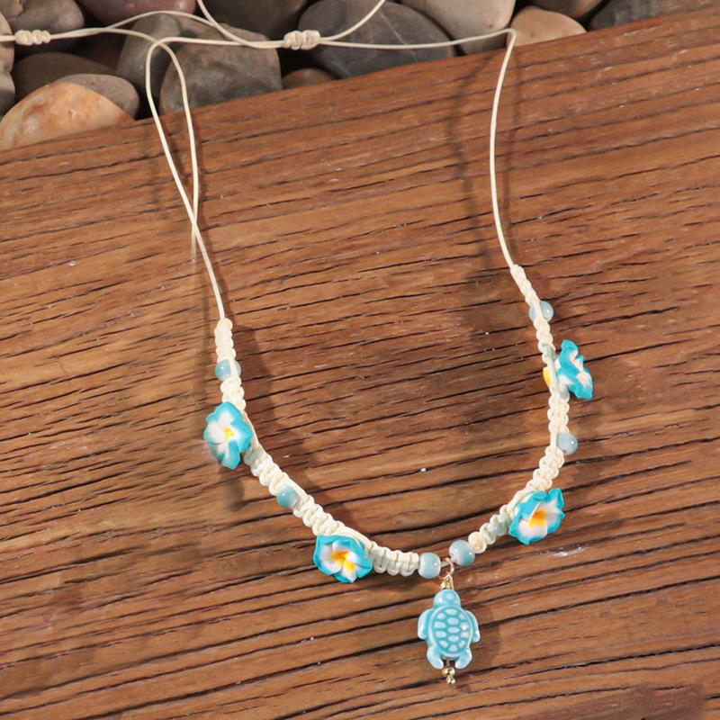 Bohemian vacation style egg flower necklace earrings set ins niche flower soft pottery color collarbone chain tide