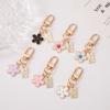 1Pcs Korean Hot-Selling Ins Metal Style Daisy Keychain Niche Usb Headphone Pendant Bag Protective Cover Pendant