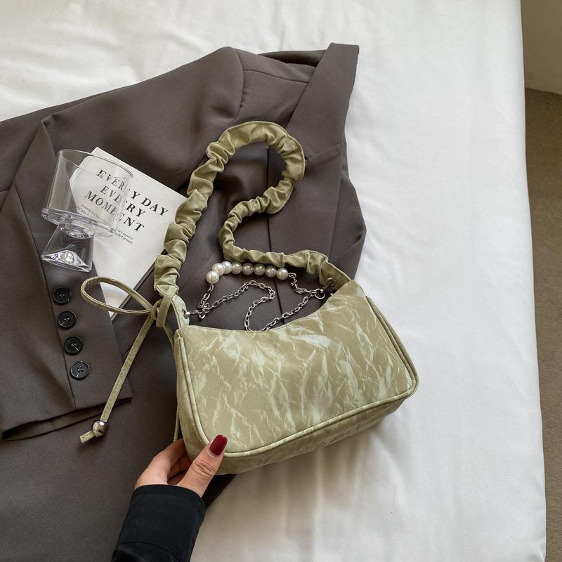 Сумка-багет с высокой стоимостью, плиссированная сумка под мышкой, женская, лето 2025, новая сумка через плечо, модная сумка-багет с жемчужной цепочкой
