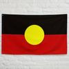 One Large Local Flag, Made of Sturdy Fabric, Featuring a Black and Red Color Scheme with a Yellow Circular Design, Suitable for Outdoor Display, and E