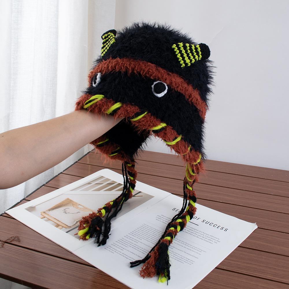 Cartoon little monster woolen hat female autumn and winter fringed braid headgear warm ear protection Lei Feng hat
