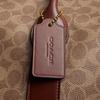 COACH Signature Compass ogo print contrasting design Coated canvas and leather Travel bag Men's Khaki and brown Khaki and brown