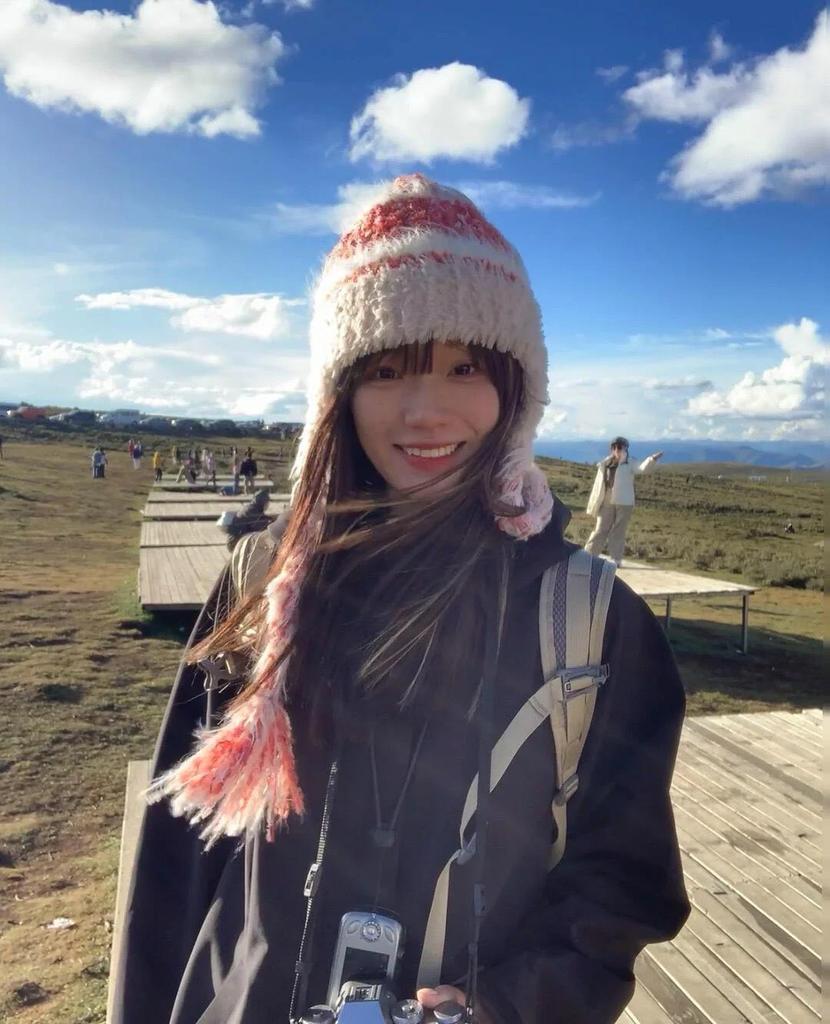 Kawanishi Women's Handmade Wool Beanie with Tassel and Ear Protection