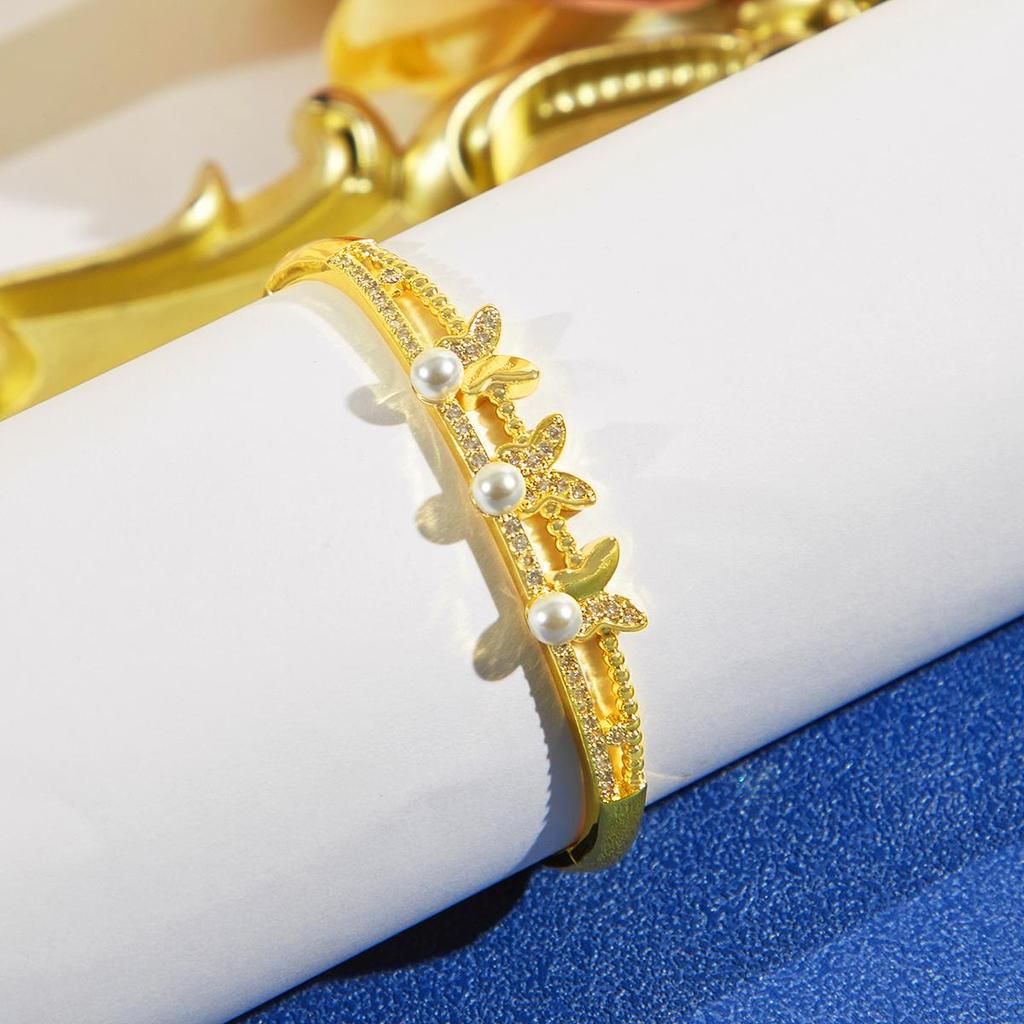 CMM Разнообразие выбора ювелирных изделий Искусственный жемчуг Золотые браслеты из циркония Браслет с подвесками Банкетные вечеринки Свадебные украшения Аксессуары для женщин